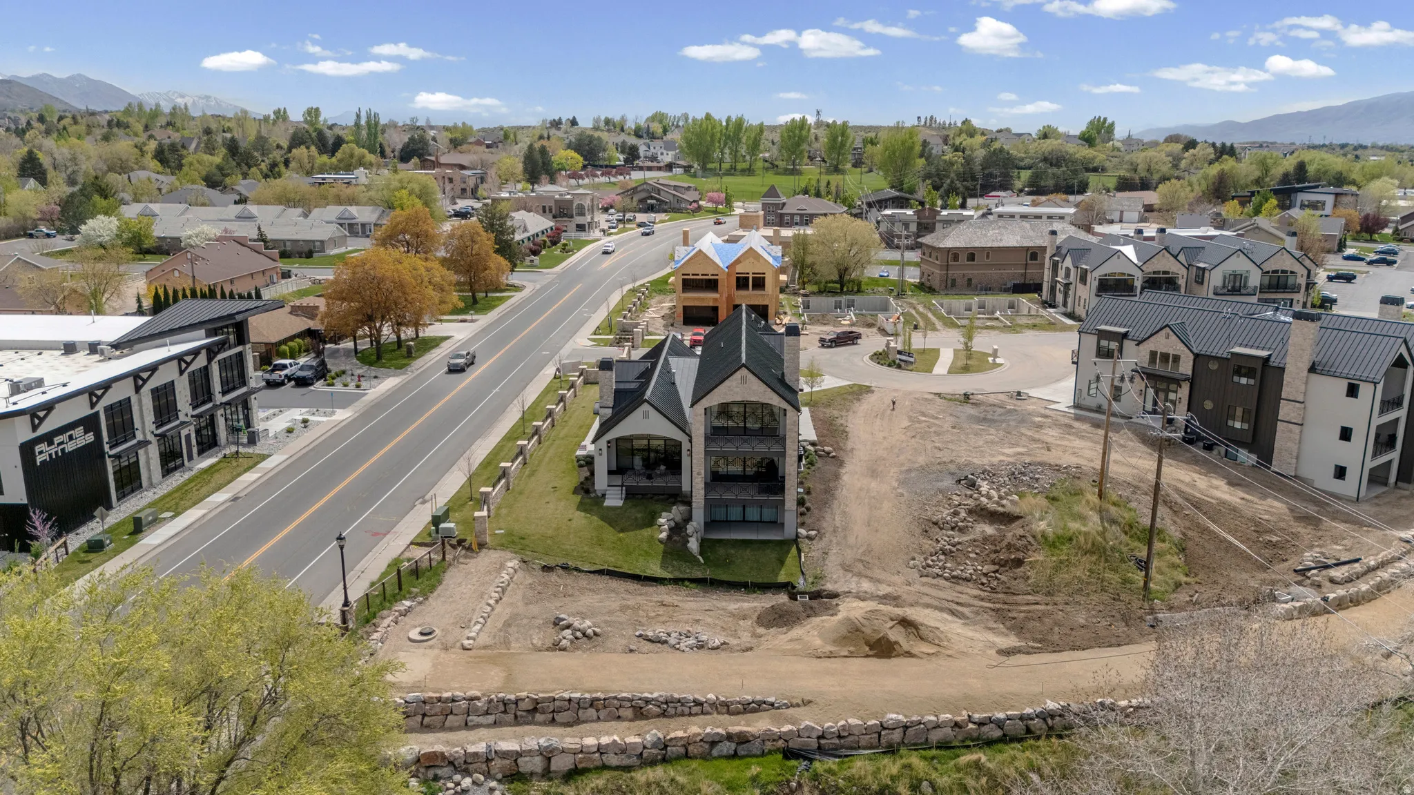 Aerial view of residential area featuring mountains