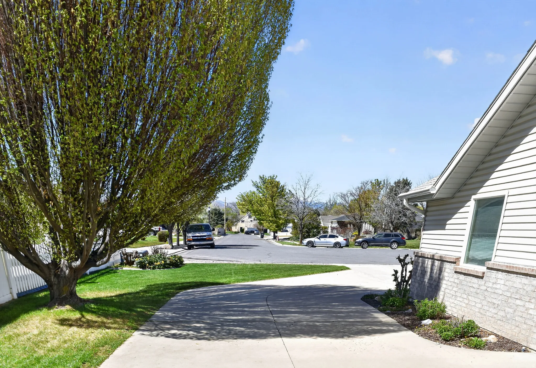 View of grassy yard with a residential view