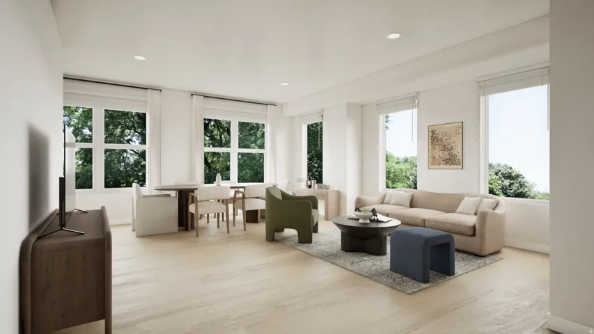 Renderings - Photos coming soon! Living room with light wood finished floors and recessed lighting