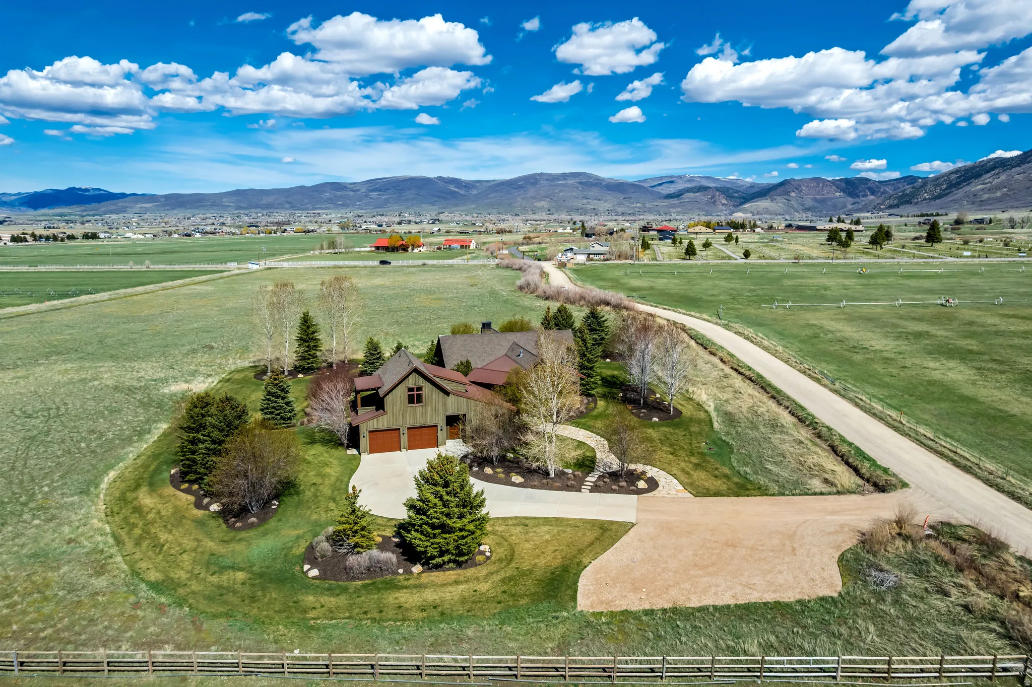 Overview of rural landscape featuring agricultural land and mountains