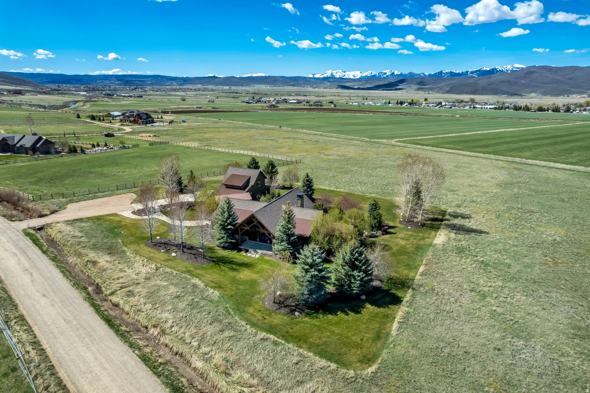 Aerial view of sparsely populated area with a mountainous background