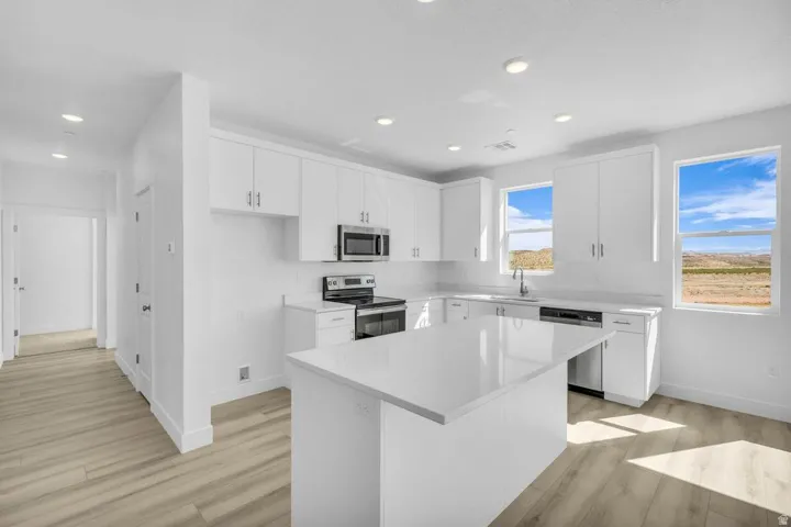 Representative photos of the same floor plan. Actual home may differ in finishes, colors, and options.