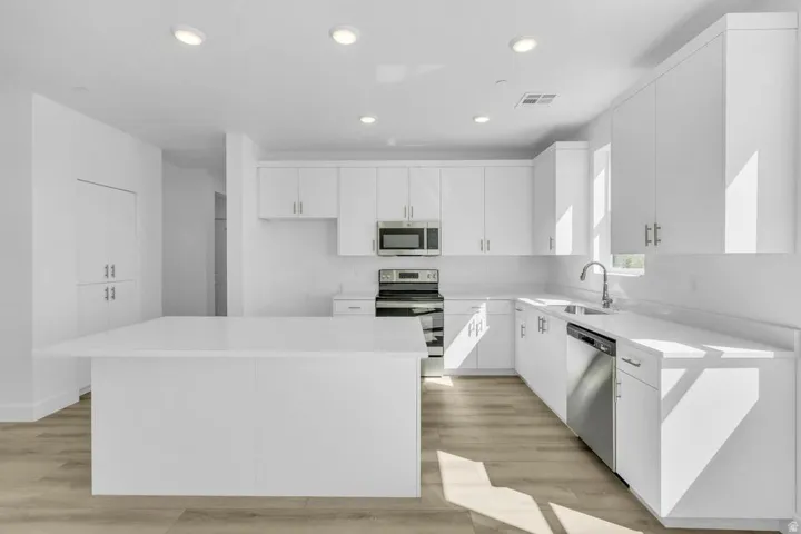 Representative photos of the same floor plan. Actual home may differ in finishes, colors, and options.
