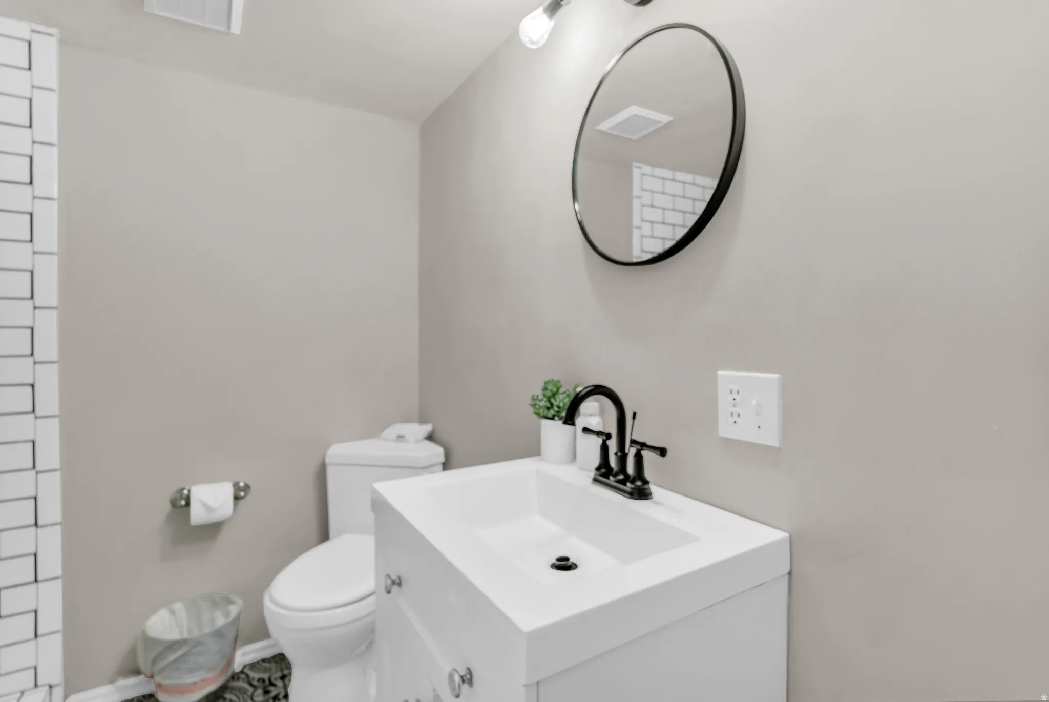 Bathroom with vanity and toilet