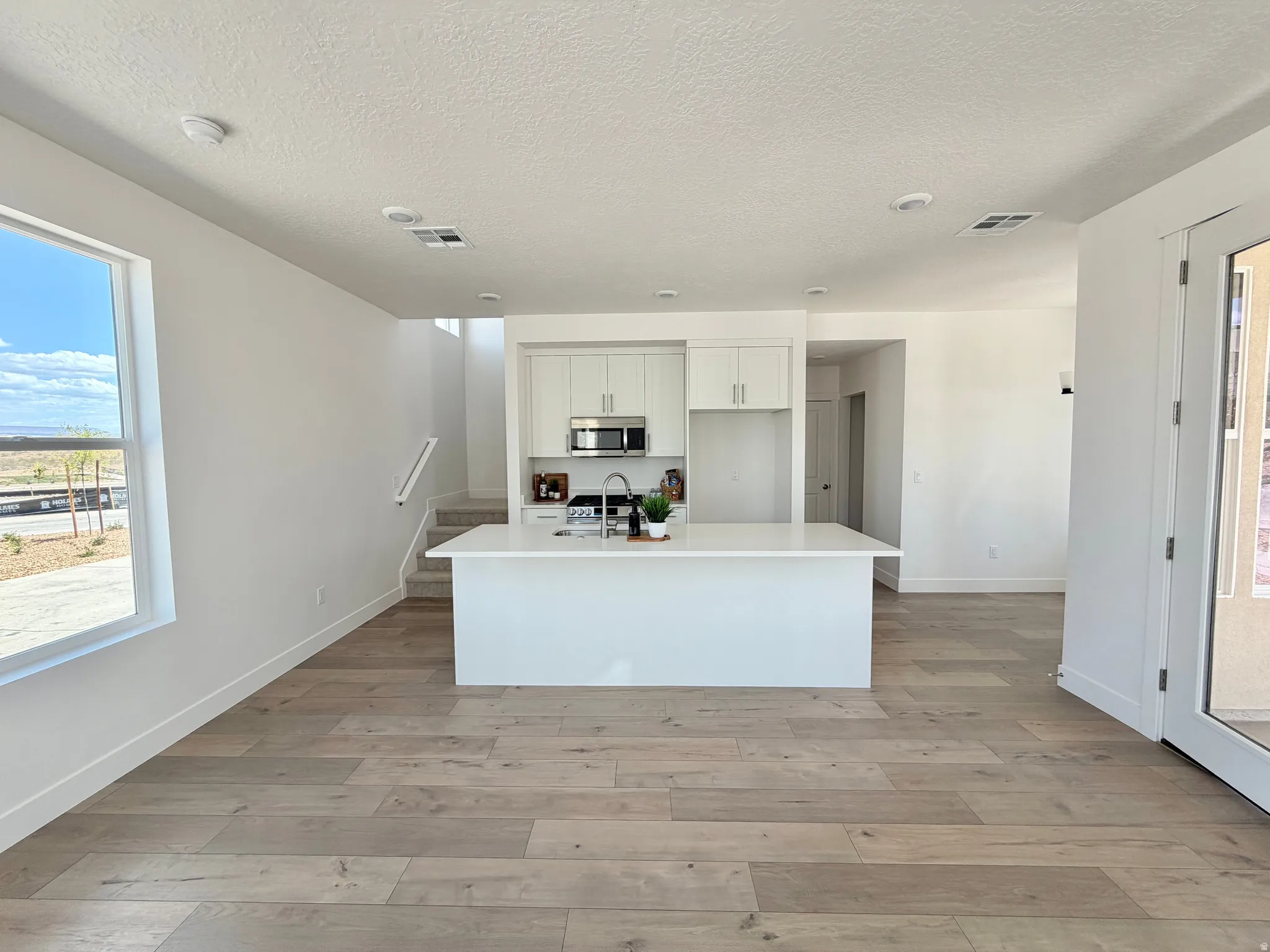 Representative photos of the same floor plan. Actual home may differ in finishes, colors, and options.