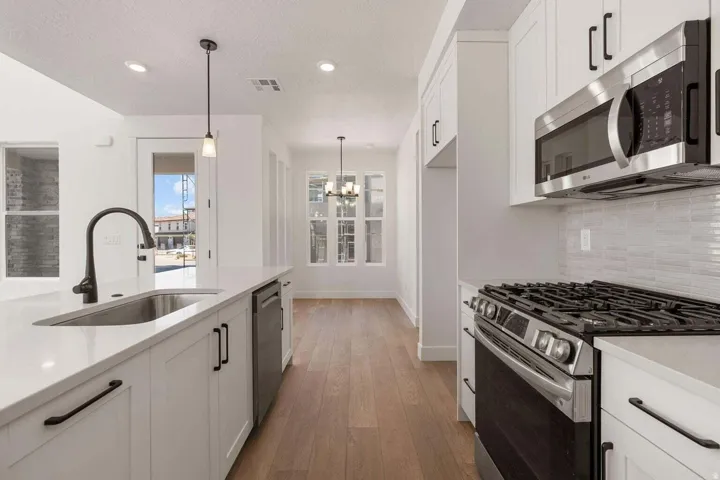 Representative photos of the same floor plan. Actual home may differ in finishes, colors, and options.