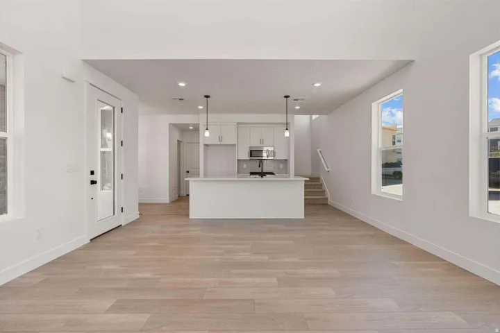 Representative photos of the same floor plan. Actual home may differ in finishes, colors, and options.