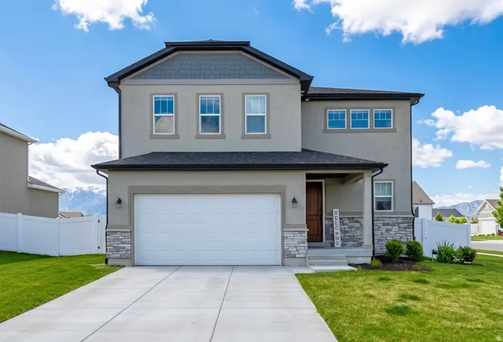 Craftsman-style house featuring stone siding, stucco siding, driveway, an attached garage, and a shingled roof