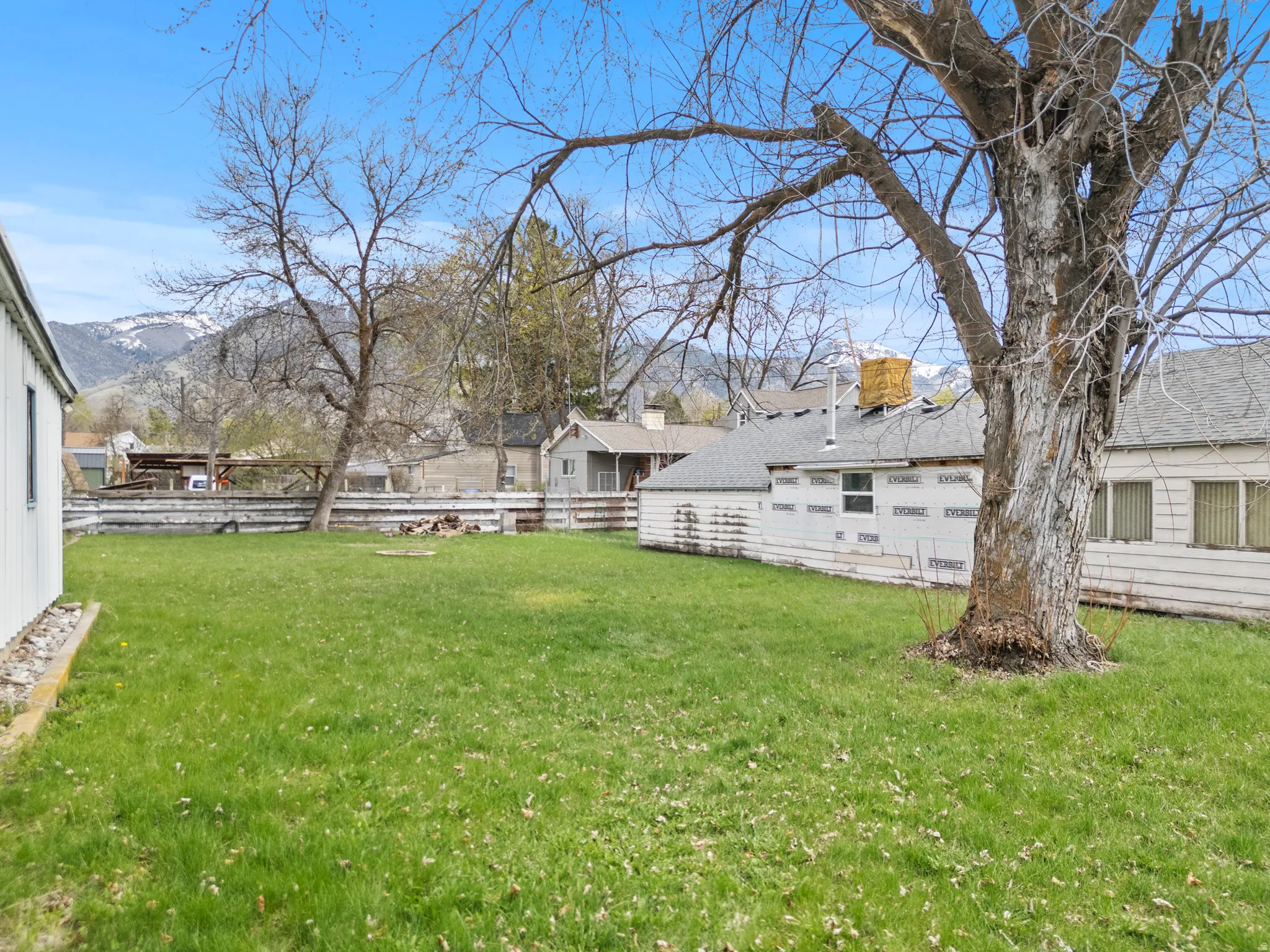 View of fenced backyard