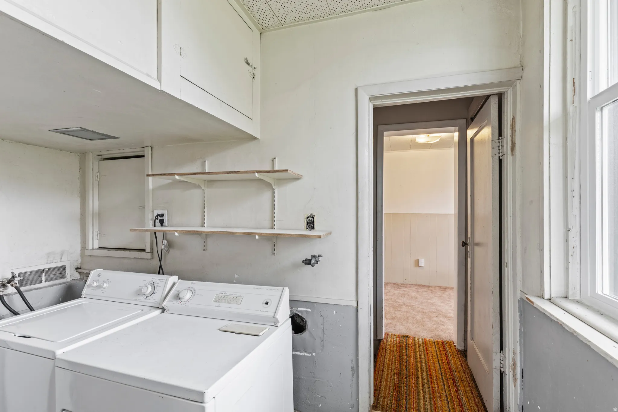 Laundry area with washing machine and dryer