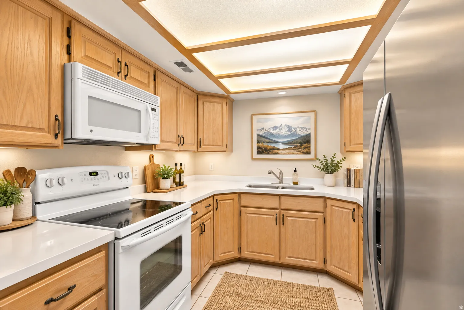 Wood-finish cabinetry, white countertops, built-in microwave, stainless steel refrigerator, and recessed ceiling lighting