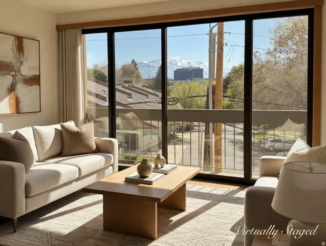 Sunroom / solarium with a mountain view