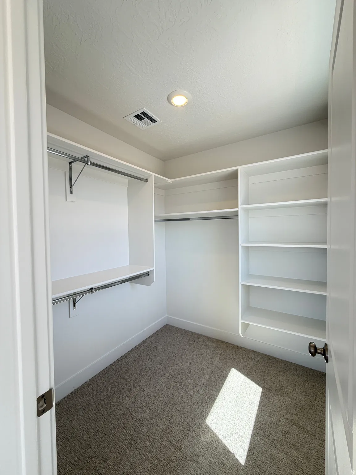 Primary Closet with Built in Organizers