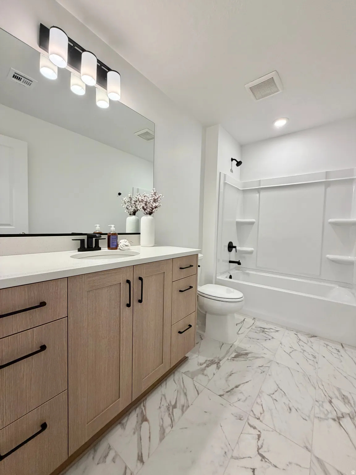 Beautiful full bathroom on entry level