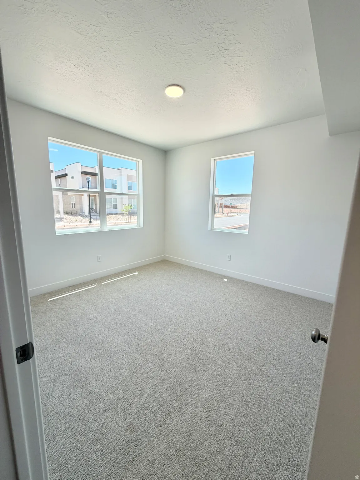 Light filled bedroom or flex room on entry level