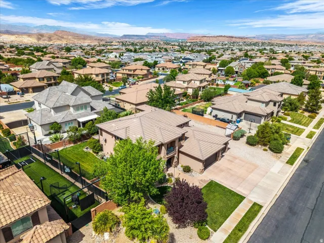 Aerial view of residential area featuring a mountain backdrop
