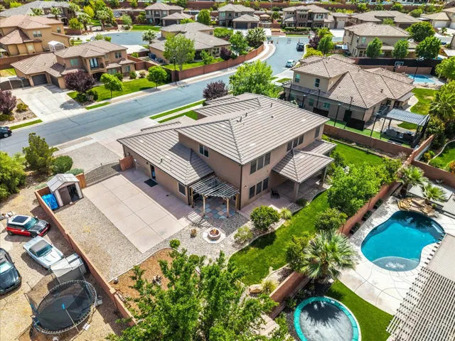 Aerial view of residential area featuring a pool area