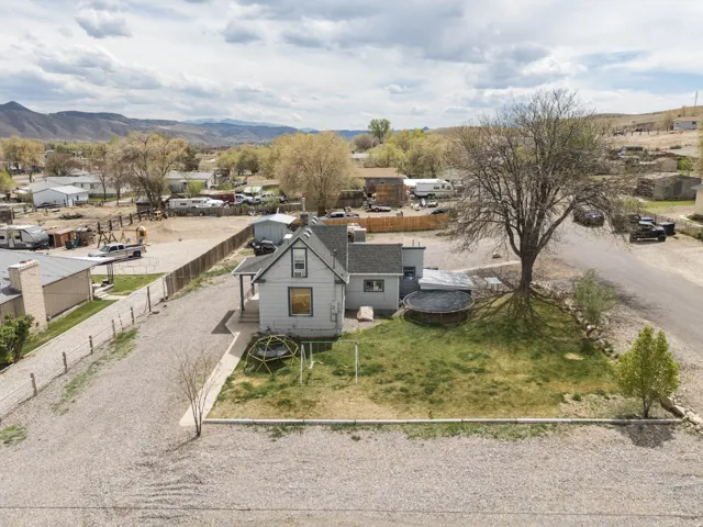 Aerial view of residential area featuring a mountain backdrop