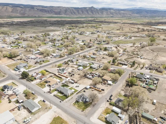 Aerial view of residential area with a mountainous background