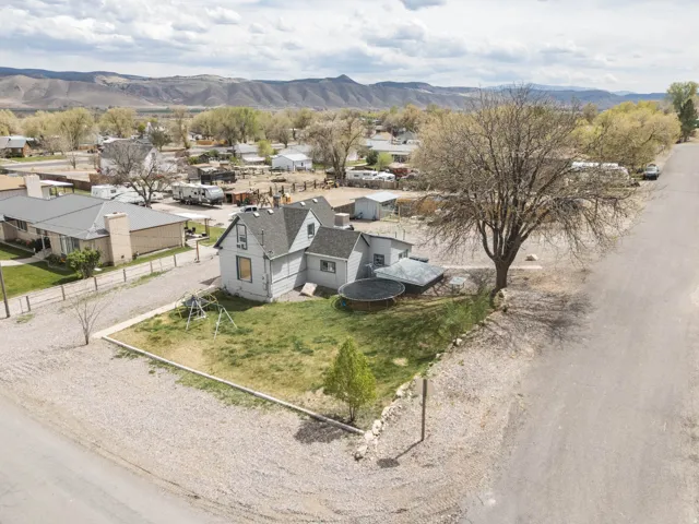 Aerial view of residential area with a mountain backdrop