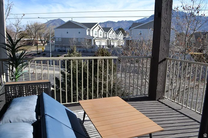 Balcony featuring a residential view