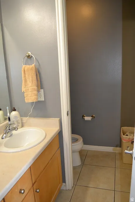 Bathroom featuring vanity and light tile patterned floors