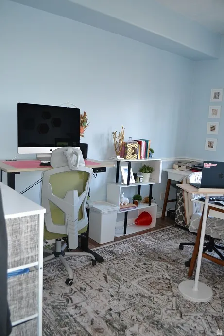 Office with wood finished floors