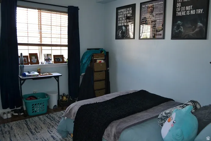Bedroom with wood finished floors