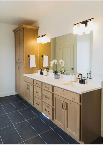 Dual vanity with white undermount sinks and black matte faucets