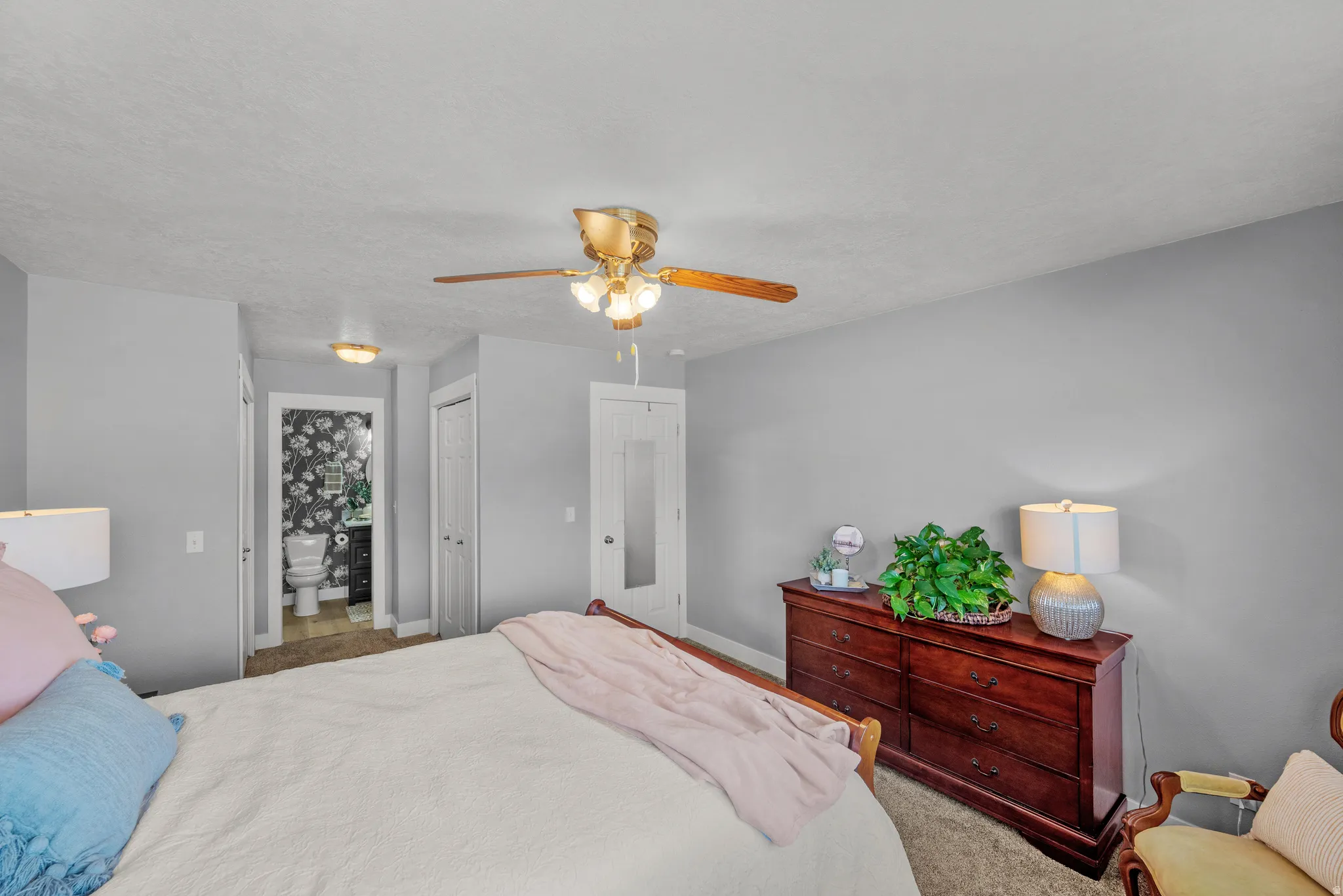 primary bedroom with access to the bathroom