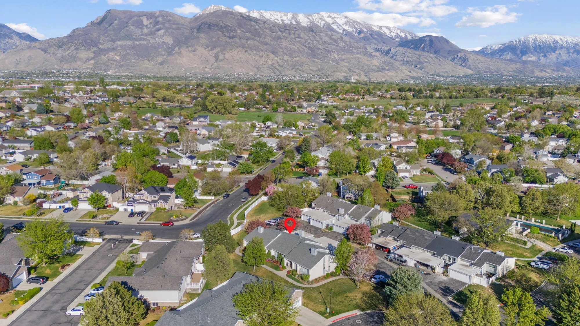 Aerial view of residential area with a mountain backdrop