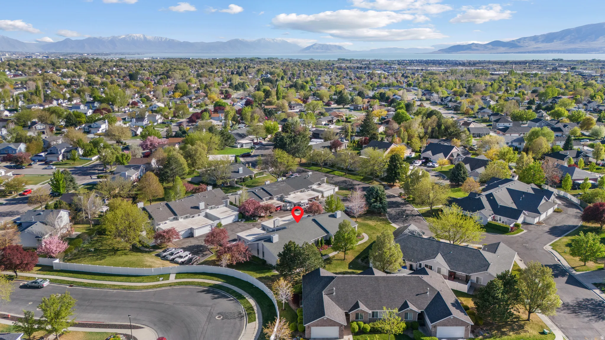 Aerial view of residential area with a mountainous background