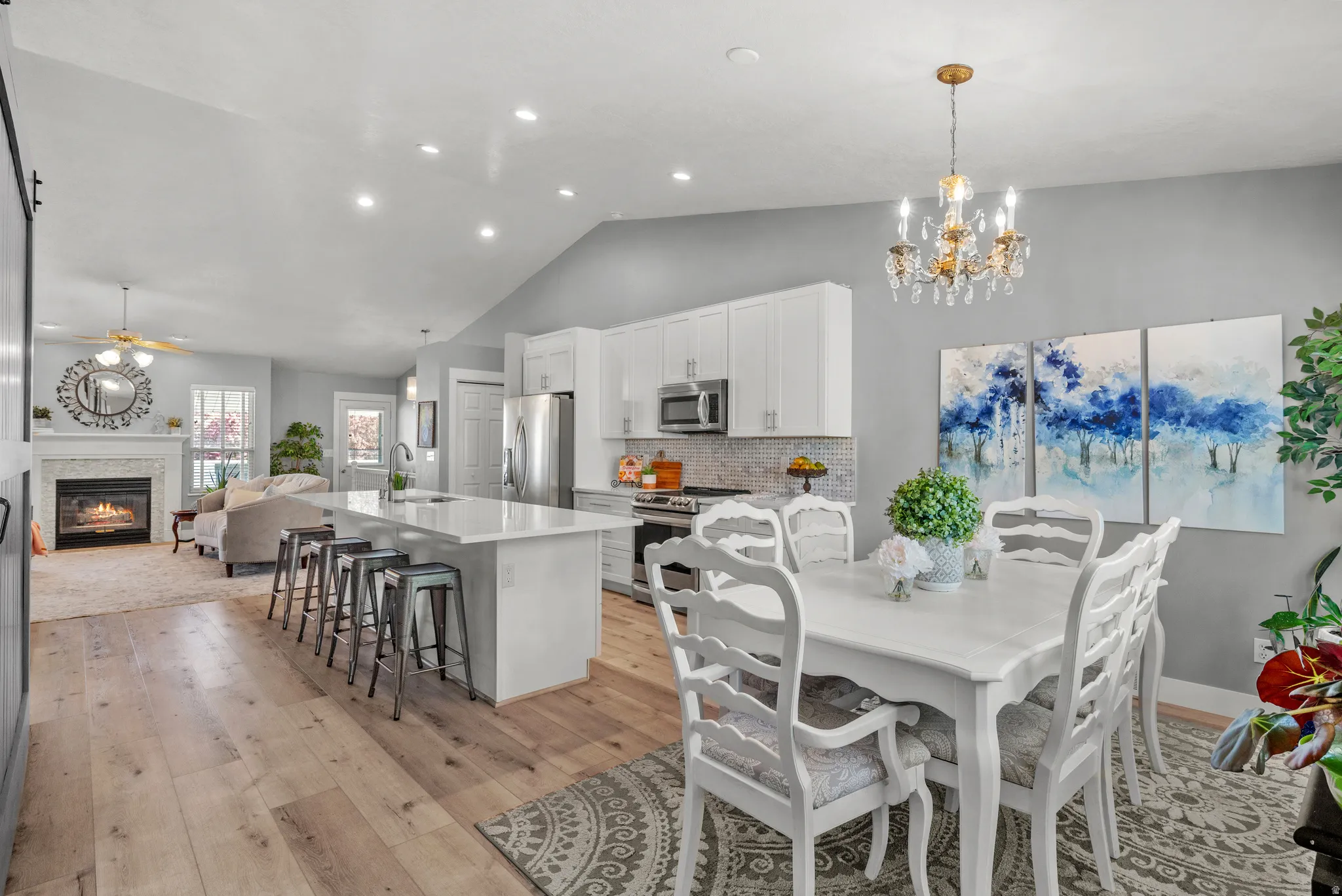 Open floor plan with vaulted ceilings and lots of natural light