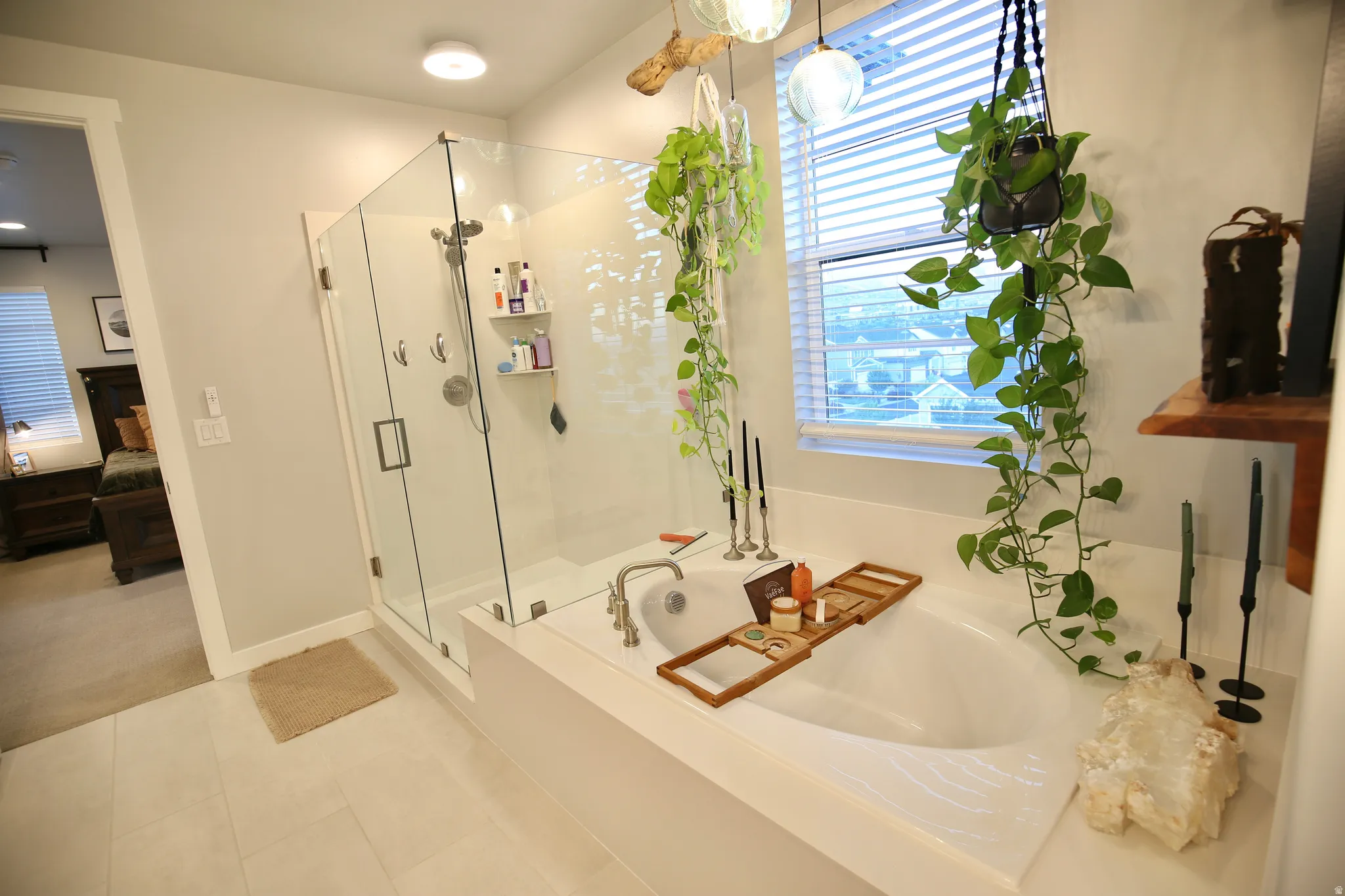 Ensuite bathroom with a garden tub and a shower stall