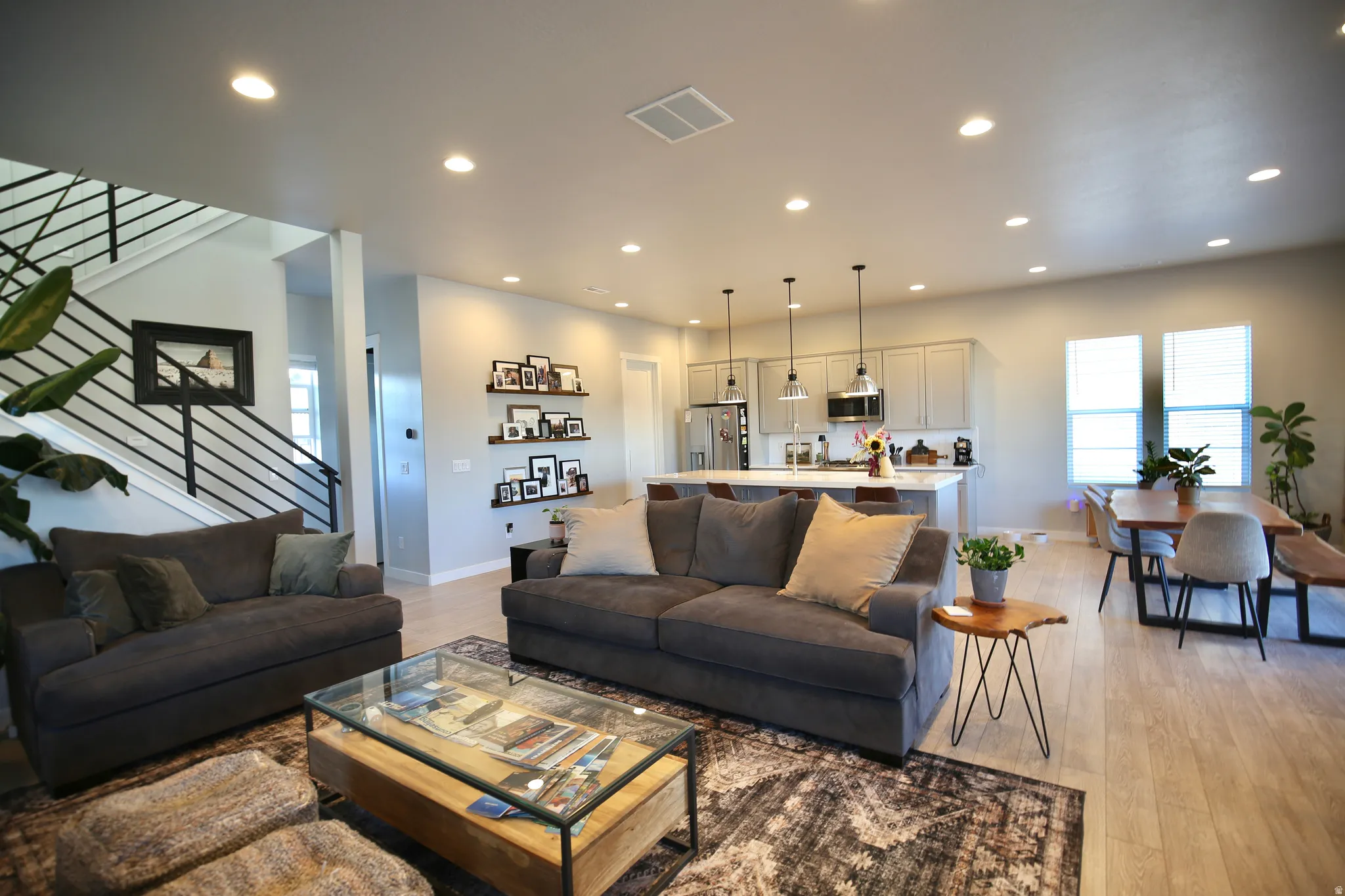 Living room featuring light wood-style floors and recessed lighting