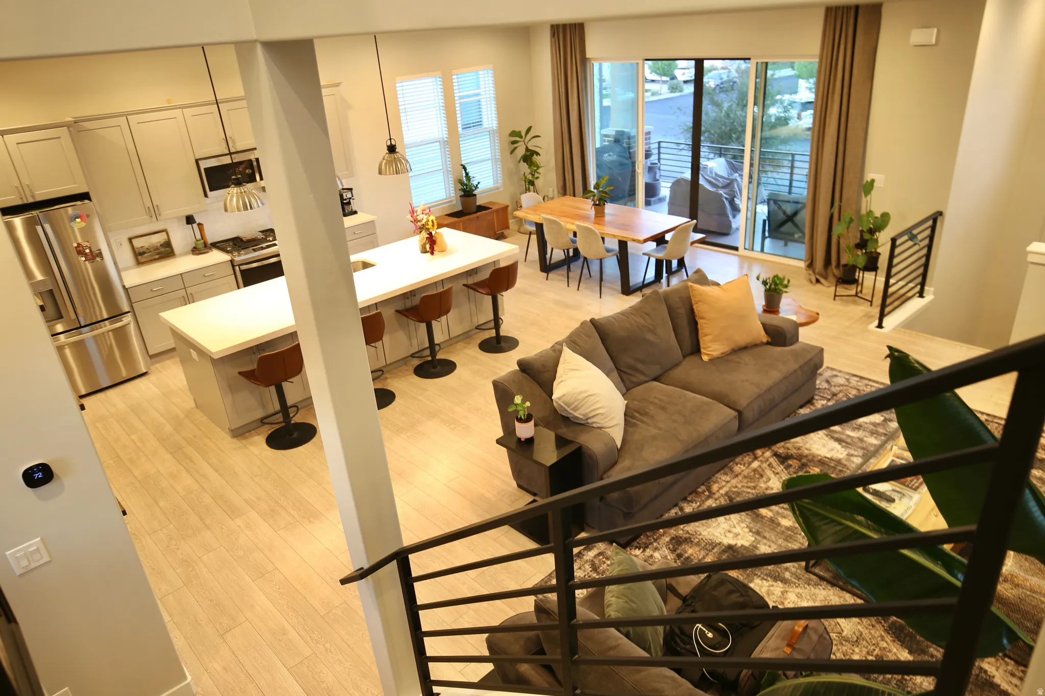 Living room with light wood-style flooring