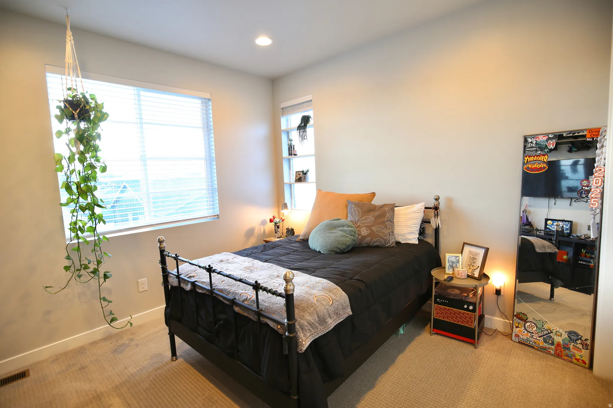 Carpeted bedroom featuring baseboards and recessed lighting