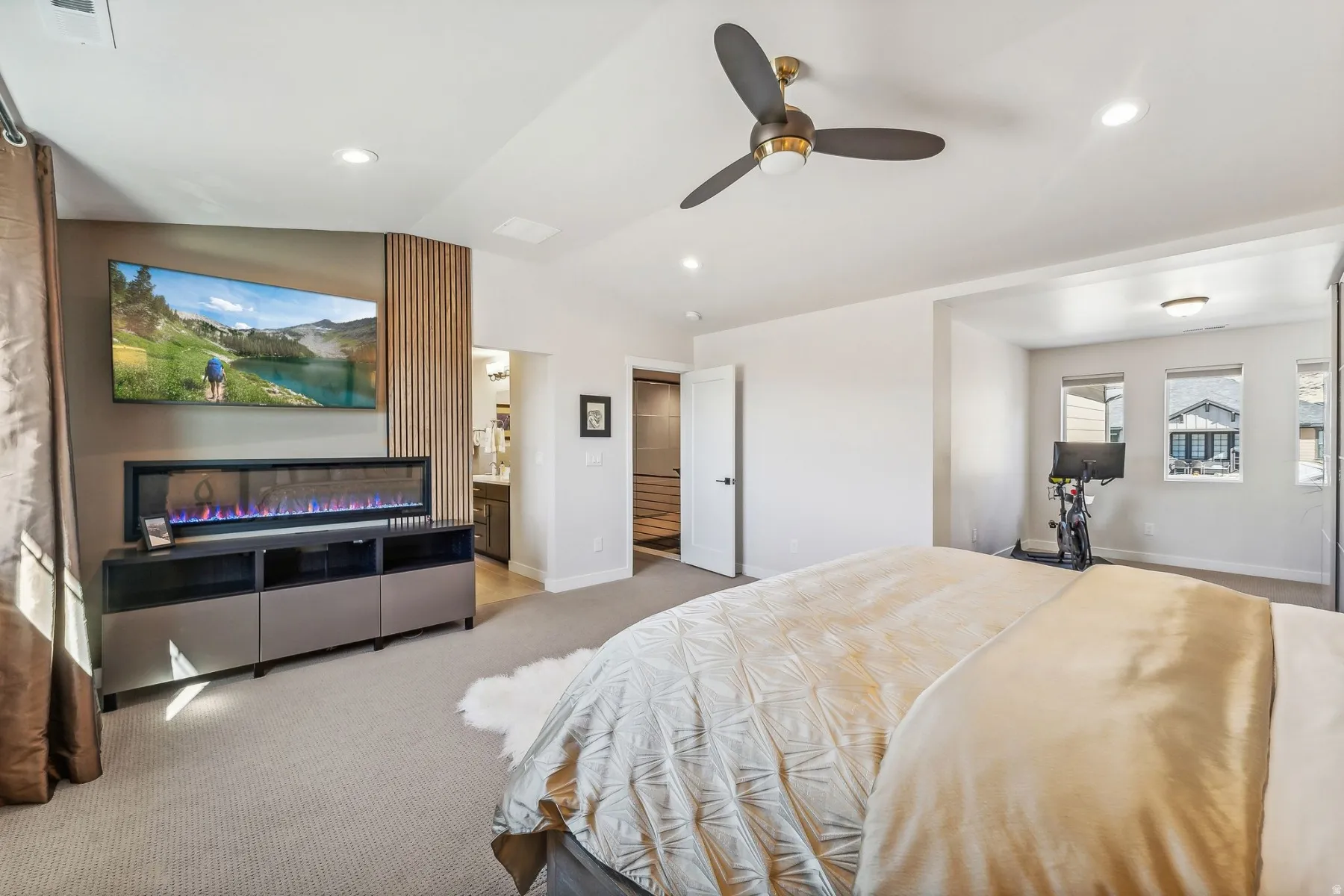 Bedroom featuring lofted ceiling, light colored carpet, ceiling fan, and recessed lighting