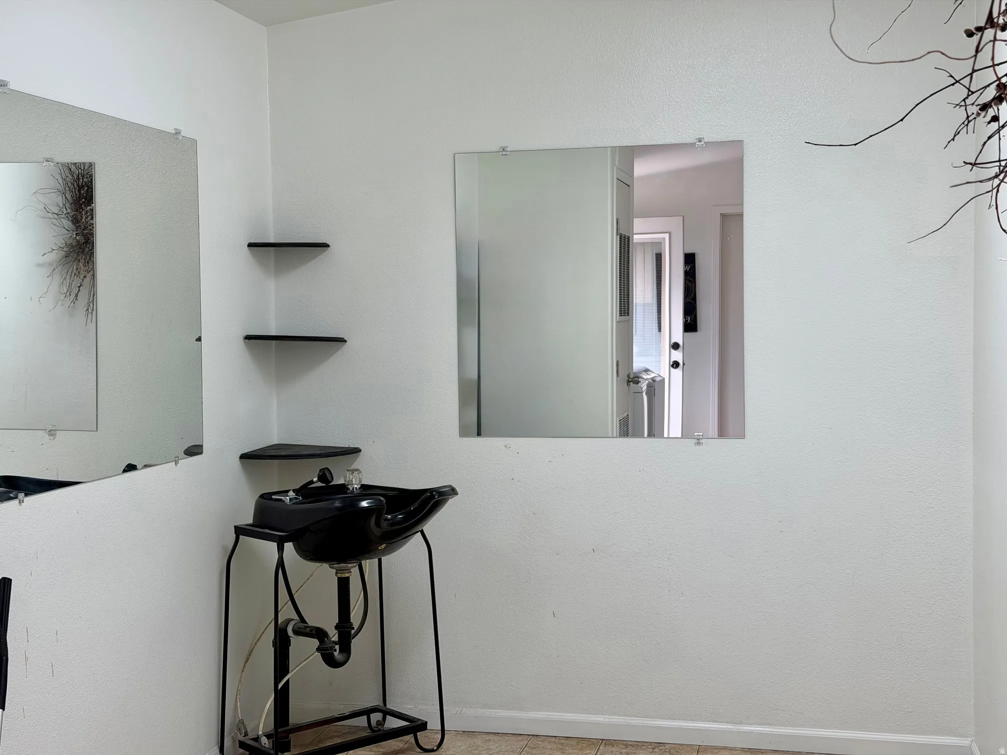 Half bath featuring baseboards