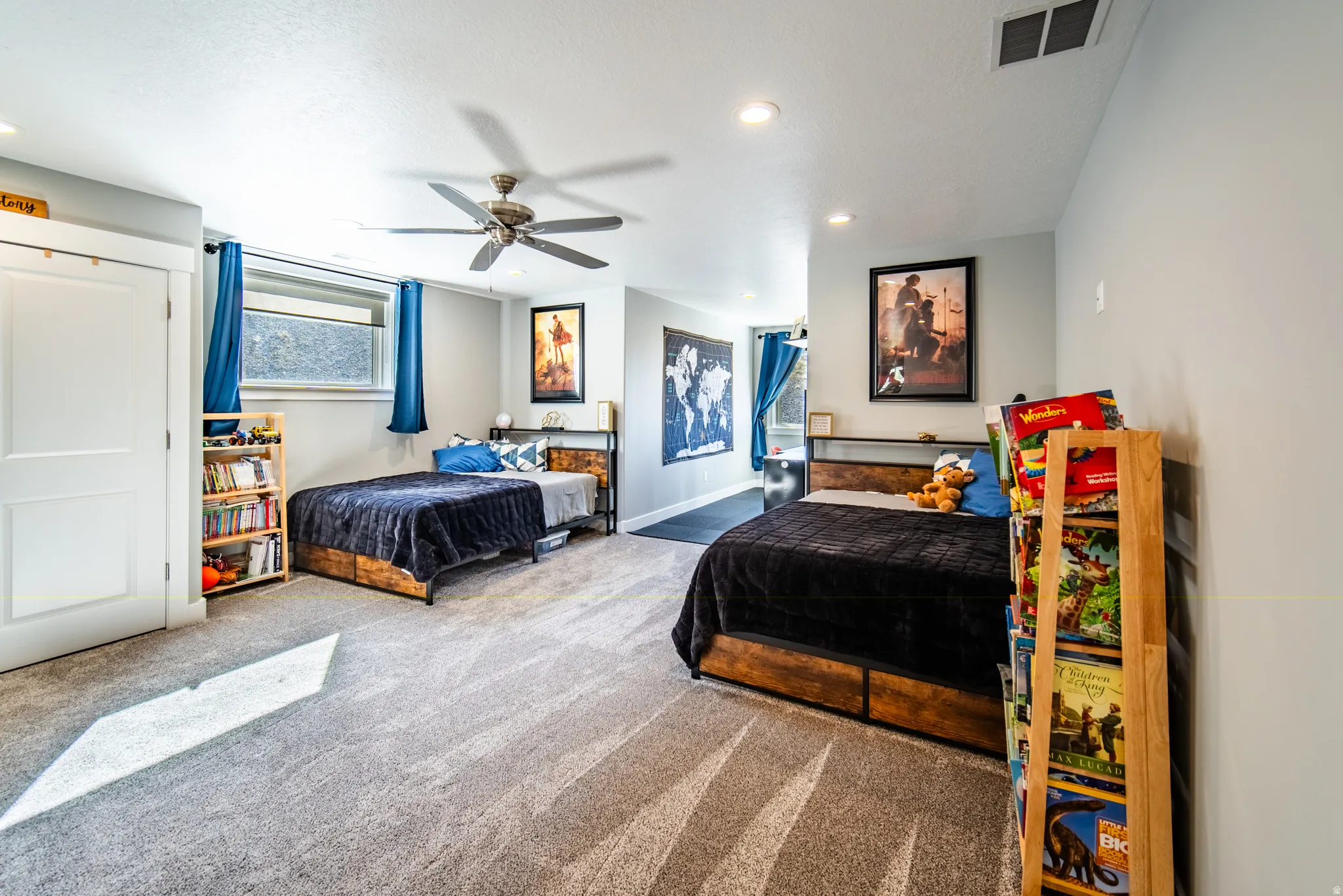 Bedroom featuring a ceiling fan, carpet, and recessed lighting