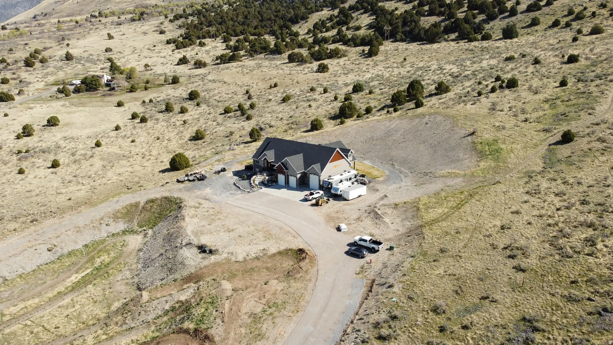 Aerial view of property and surrounding area featuring a desert landscape and rural landscape