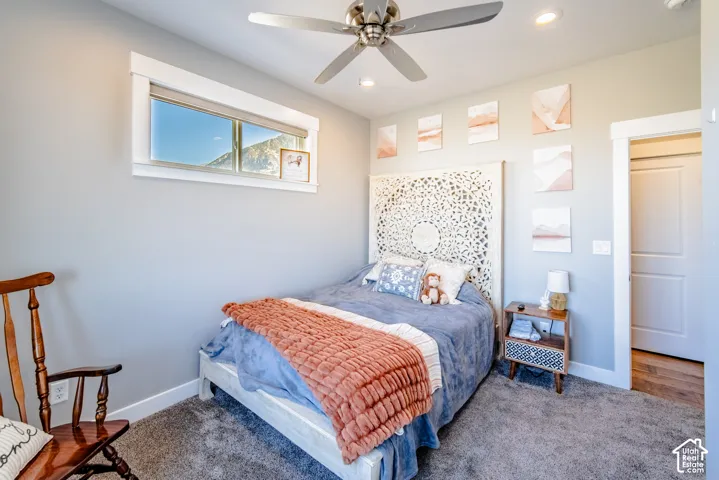 Bedroom with ceiling fan, carpet, and recessed lighting