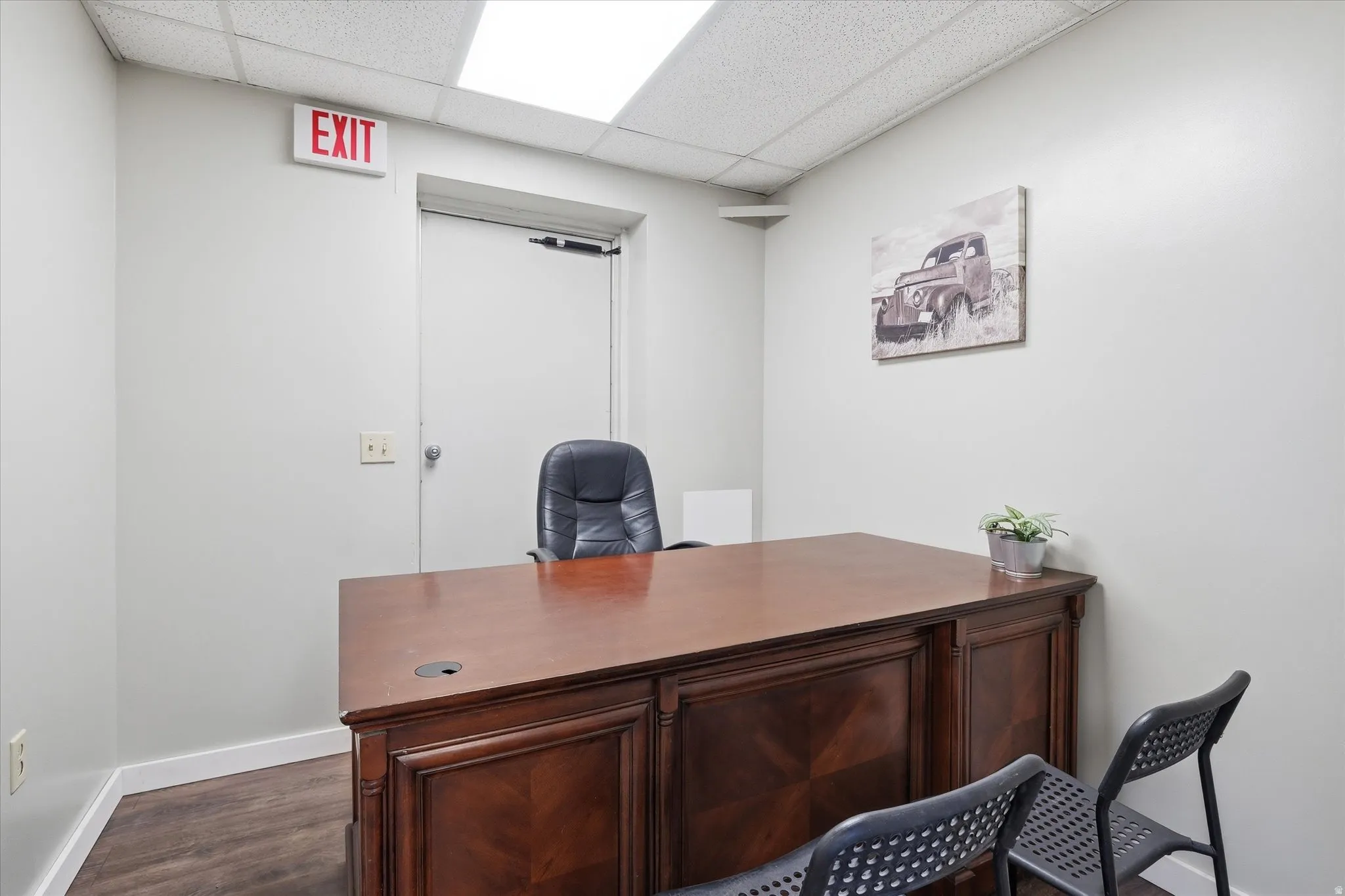 Office space featuring a drop ceiling