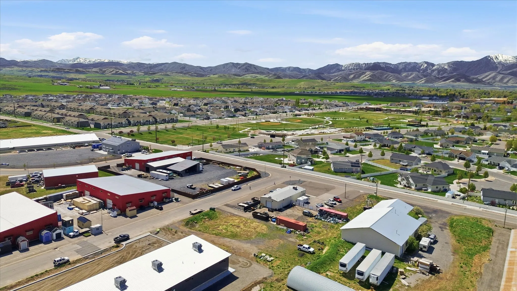 Aerial view of residential area featuring mountains