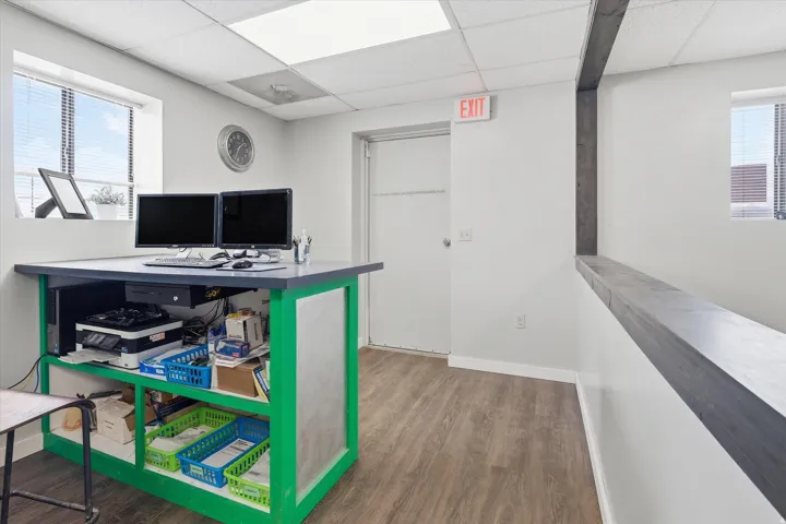 Office area featuring a drop ceiling