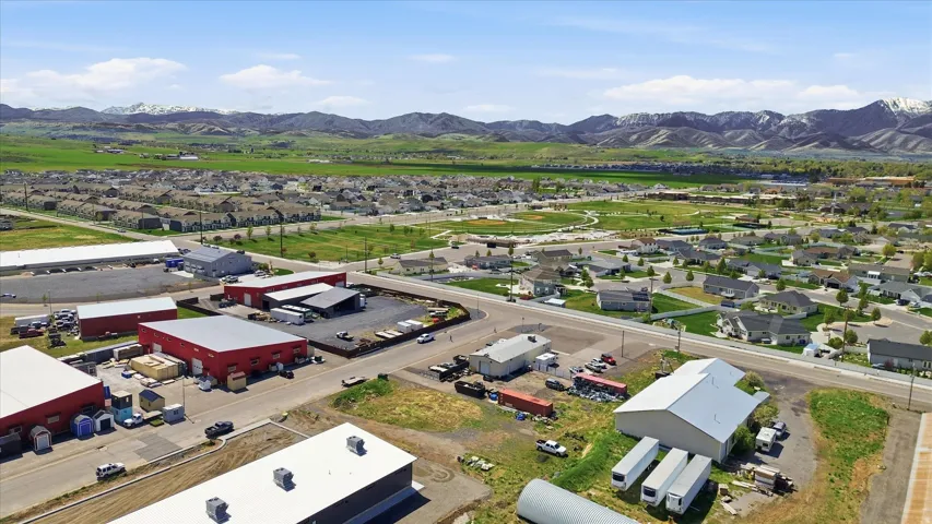 Aerial view of residential area featuring mountains