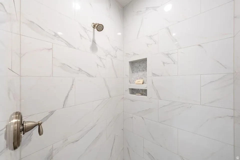 Bathroom view of tiled shower