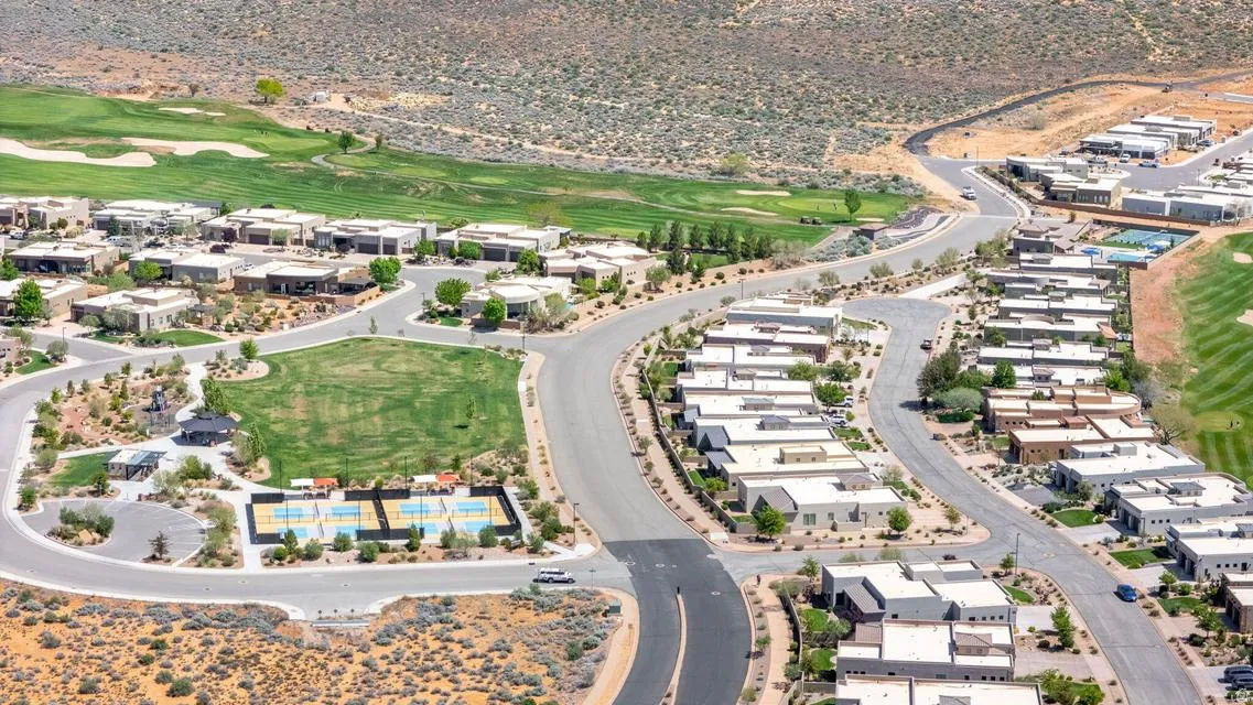 Aerial view of property's location with a golf course