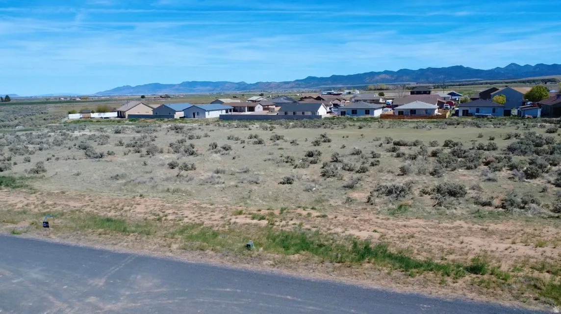 View of mountain backdrop with nearby suburban area