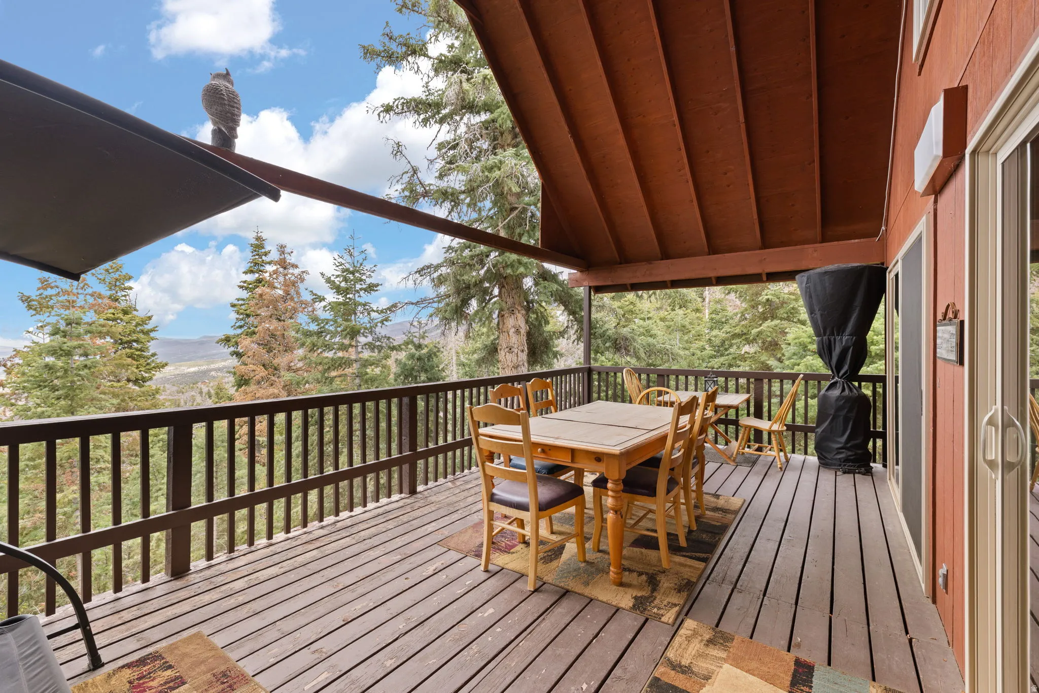 Cabin 2 - East; Deck featuring outdoor dining area